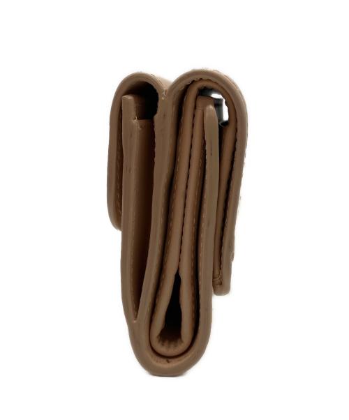 Chloe（クロエ）Chloe (クロエ) Cロゴコンパクトウォレット ベージュの古着・服飾アイテム