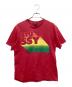 stussy（ステューシー）の古着「90ｓ紺タグプリントTシャツ」｜レッド