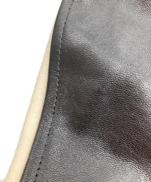 Saint Laurent Paris（サンローランパリ）Saint Laurent Paris (サンローランパリ) バックレザーパッチ ヴァーシティジャケット ブラック×ホワイト サイズ:40の古着・服飾アイテム