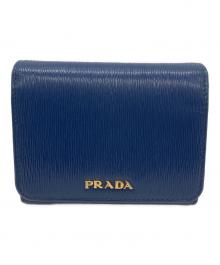 PRADA（プラダ）の古着「サフィアーノコンパクトウォレット」｜ブルー