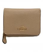 COACHコーチ）の古着「2つ折り財布」｜ベージュ