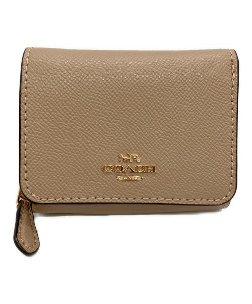 COACH（コーチ）COACH (コーチ) 2つ折り財布 ベージュの古着・服飾アイテム