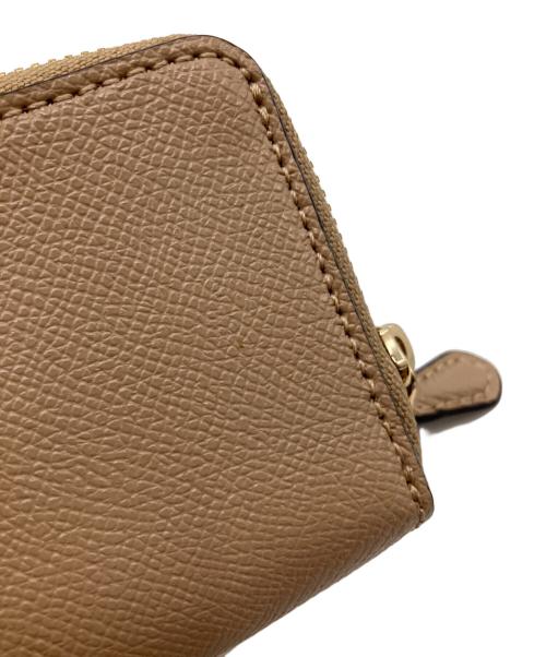 COACH（コーチ）COACH (コーチ) 2つ折り財布 ベージュの古着・服飾アイテム