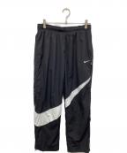 NIKEナイキ）の古着「ナイロンパンツビッグスウッシュウーブンパンツ」｜ブラック