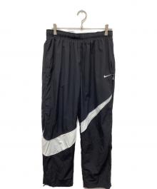 NIKE（ナイキ）の古着「ナイロンパンツビッグスウッシュウーブンパンツ」｜ブラック