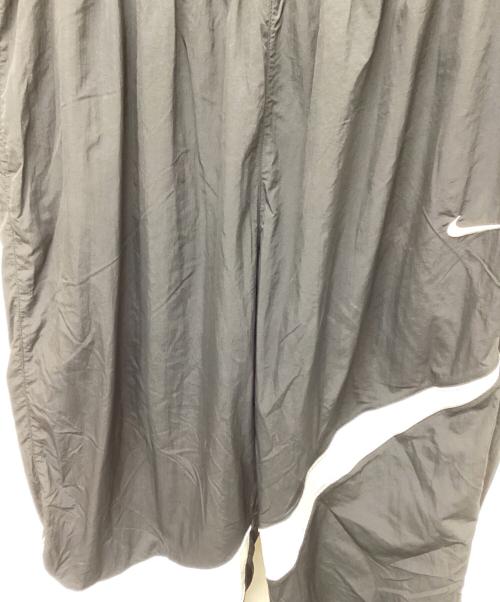 NIKE（ナイキ）NIKE (ナイキ) ナイロンパンツビッグスウッシュウーブンパンツ ブラック サイズ:XLの古着・服飾アイテム