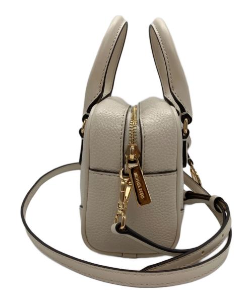 MICHAEL KORS（マイケルコース）MICHAEL KORS (マイケルコース) THOMPSON サッチェル エクストラスモール ホワイトの古着・服飾アイテム