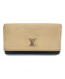 LOUIS VUITTON（ルイ ヴィトン）の古着「ポルトフォイユロックミーII/長財布」｜ベージュ×ブラック