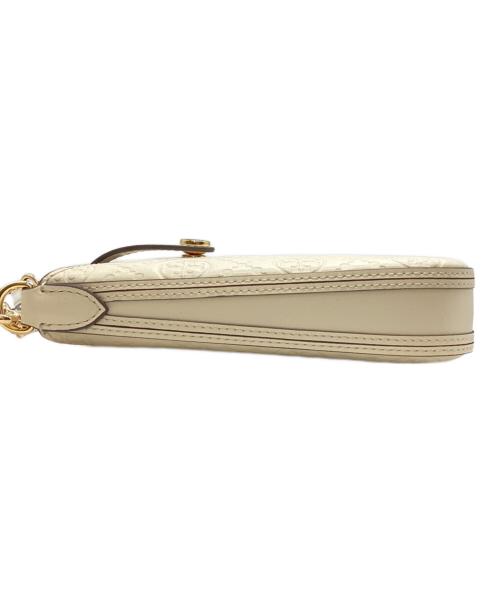 TORY BURCH（トリーバーチ）TORY BURCH (トリーバーチ) Tモノグラム レザー フォン クロスボディ ホワイトの古着・服飾アイテム