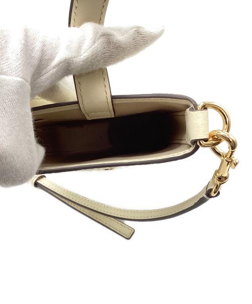 TORY BURCH（トリーバーチ）TORY BURCH (トリーバーチ) Tモノグラム レザー フォン クロスボディ ホワイトの古着・服飾アイテム