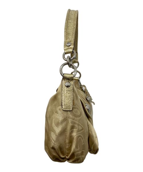 COACH（コーチ）COACH (コーチ) ポピー ストーリーパッチ グルーヴィー 2WAY ショルダーバッグ ゴールドの古着・服飾アイテム
