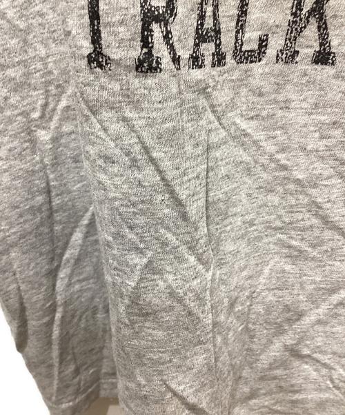 jim&lany（ジム&ラニ―）jim&lany (ジム&ラニ―) ウィングフットプリントリンガーTシャツ グレー サイズ:Lの古着・服飾アイテム