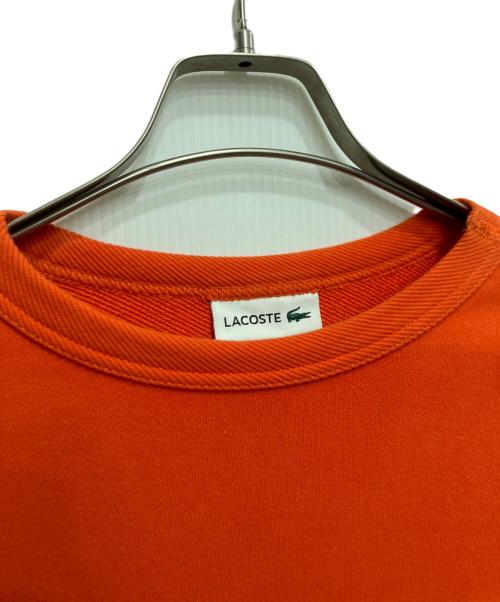 LACOSTE（ラコステ）LACOSTE (ラコステ) プレミアムコットンクルーネックスウェット オレンジ サイズ:Mの古着・服飾アイテム