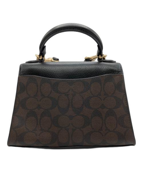 COACH（コーチ）COACH (コーチ) ペッパー サッチェル シグネチャー キャンバス ブラック×ブラウンの古着・服飾アイテム