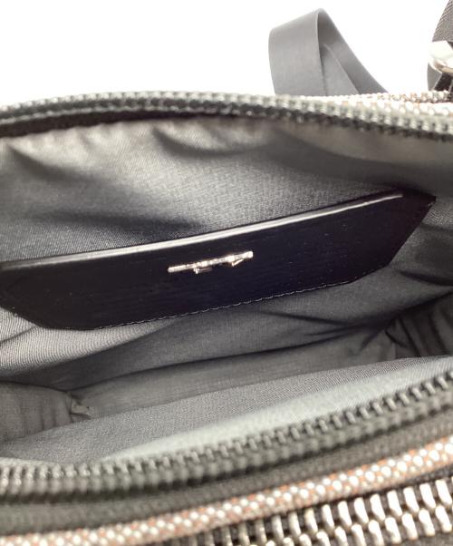 TUMI（トゥミ）TUMI (トゥミ) Pocket Bag Small グレーの古着・服飾アイテム