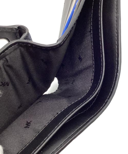 MICHAEL KORS（マイケル・コース）MICHAEL KORS (マイケル・コース) Cooper Logo Stripe Billfold Wallet With Passcase ネイビーの古着・服飾アイテム