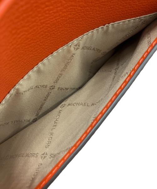 MICHAEL KORS（マイケル・コース）MICHAEL KORS (マイケル・コース) JET SET TRAVEL レザー クロスボディ ミディアム オレンジの古着・服飾アイテム