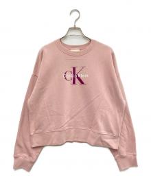 Calvin Klein Jeans（カルバンクラインジーンズ）の古着「モノグラムロゴリラックスクルーネックスウェットプルオーバー」｜ピンク