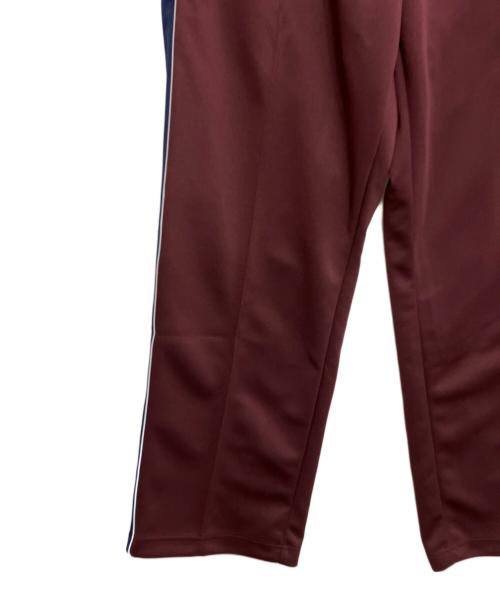 asics（アシックス）asics (アシックス) YOASOBI (ヨアソビ) ニットパンツ バーガンディー サイズ:L 未使用品の古着・服飾アイテム