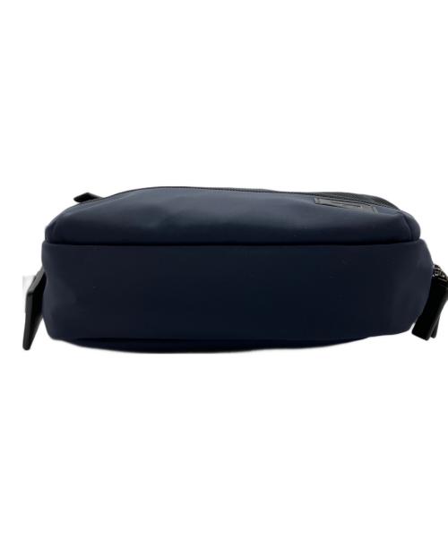 TUMI（トゥミ）TUMI (トゥミ) DANIEL UTILITY POUCH ネイビーの古着・服飾アイテム