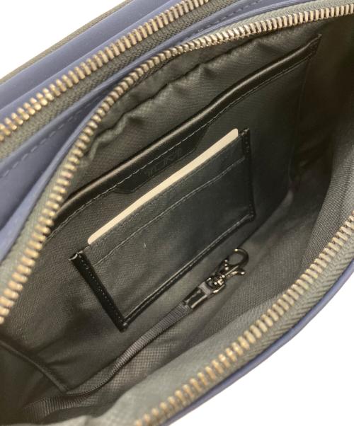 TUMI（トゥミ）TUMI (トゥミ) DANIEL UTILITY POUCH ネイビーの古着・服飾アイテム