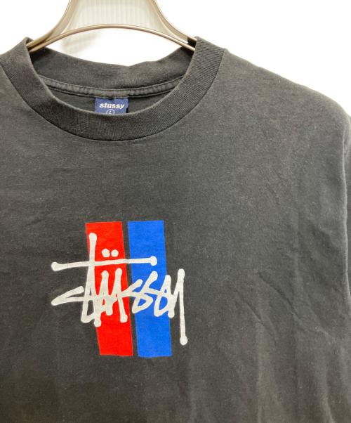 stussy（ステューシー）stussy (ステューシー) プリントTシャツ ブラック サイズ:Lの古着・服飾アイテム