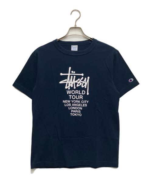 Champion（チャンピオン）Champion (チャンピオン) stussy (ステューシー) World Tour Tee （ワールド ツアー ティー） ブルー サイズ:Mの古着・服飾アイテム