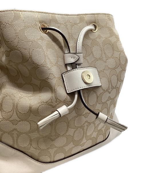 COACH（コーチ）COACH (コーチ) シグネチャーキャンバスリュック アイボリーの古着・服飾アイテム