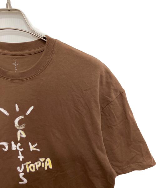 Cactus Jack by Travis Scott（カクタスジャック バイ トラヴィス スコット）Cactus Jack by Travis Scott (カクタスジャック バイ トラヴィス スコット) UTOPIA T-Shirt ブラウン サイズ:Lの古着・服飾アイテム