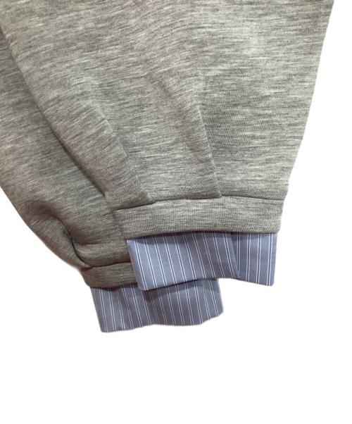 Olu.（オルドット）Olu. (オルドット) フリルレイヤードダンボールスウェット グレー サイズ:FREE 未使用品の古着・服飾アイテム