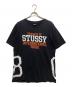 stussy（ステューシー）の古着「INTER NATIONAL TRIBE Tシャツ（インターナショナルトゥライブ Tシャツ）」｜ブラック