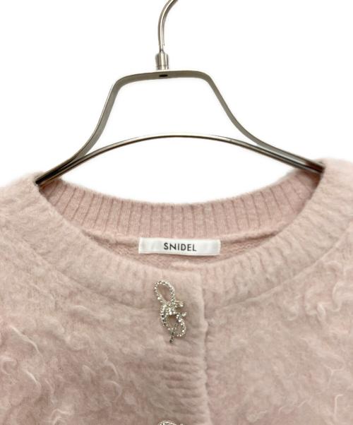 Snidel（スナイデル）Snidel (スナイデル) ビジューリボンカーディガン ピンク サイズ:FREEの古着・服飾アイテム