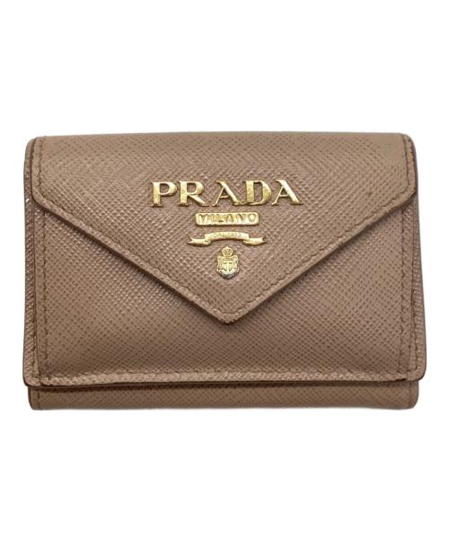 PRADA（プラダ）PRADA (プラダ) サフィアーノコンパクトウォレット ベージュの古着・服飾アイテム