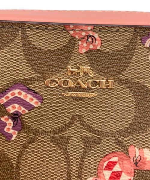 COACH（コーチ）COACH (コーチ) キャンディープリント ミニカメラバッグ ベージュ×ピンクの古着・服飾アイテム