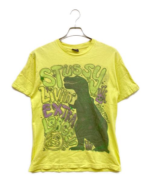 stussy（ステューシー）stussy (ステューシー) 恐竜 プリントTシャツ イエロー サイズ:Mの古着・服飾アイテム