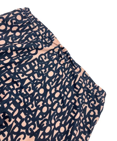 COMME des GARCONS（コムデギャルソン）COMME des GARCONS (コムデギャルソン) タトゥープリント レギンスパンツ ベージュ サイズ:Mの古着・服飾アイテム
