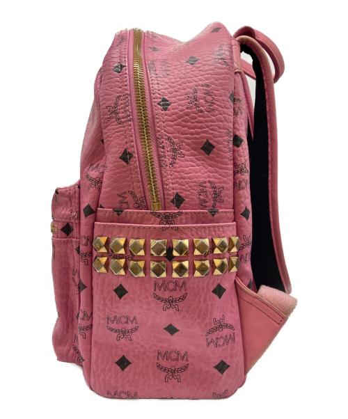 MCM（エムシーエム）MCM (エムシーエム) モノグラム スタッズバックパック ピンクの古着・服飾アイテム