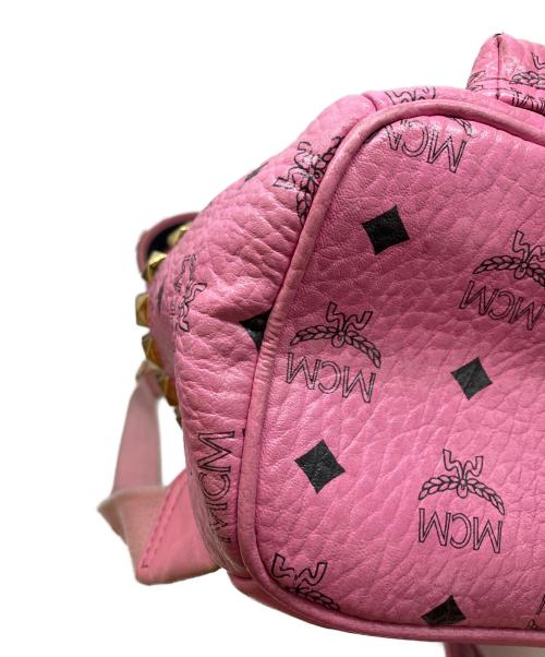 MCM（エムシーエム）MCM (エムシーエム) モノグラム スタッズバックパック ピンクの古着・服飾アイテム