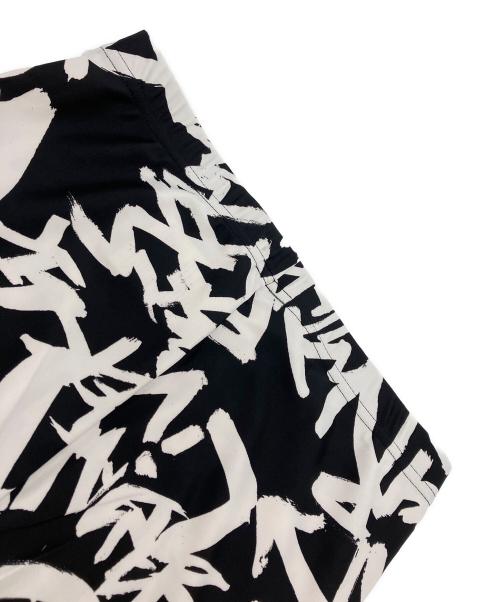 COMME des GARCONS（コムデギャルソン）COMME des GARCONS (コムデギャルソン) グラフィティプリントストレッチレギンスパンツ ブラック×ホワイト サイズ:Sの古着・服飾アイテム