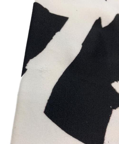 COMME des GARCONS（コムデギャルソン）COMME des GARCONS (コムデギャルソン) グラフィティプリントストレッチレギンスパンツ ブラック×ホワイト サイズ:Sの古着・服飾アイテム