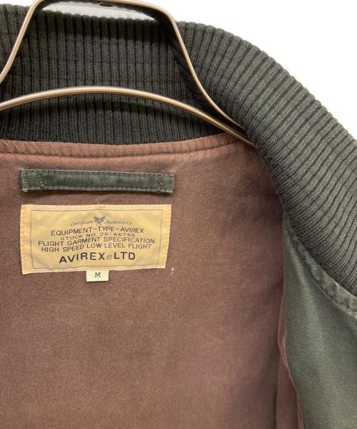 AVIREX（アヴィレックス）AVIREX (アヴィレックス) バックプリント タンカースジャケット オリーブ サイズ:Mの古着・服飾アイテム