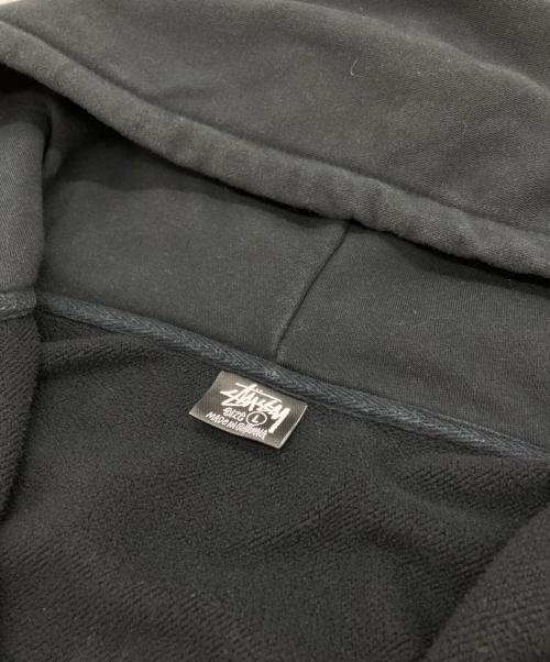 stussy（ステューシー）stussy (ステューシー) WORLD TOUR ZIP HOODIE ブラック サイズ:SIZE Lの古着・服飾アイテム