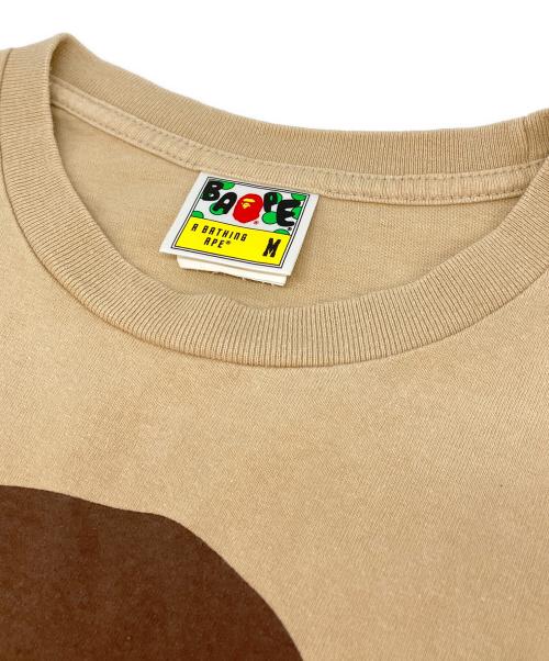 A BATHING APE（アベイシングエイプ）A BATHING APE (アベイシングエイプ) サルプリントTシャツ ベージュ サイズ:SIZE Mの古着・服飾アイテム