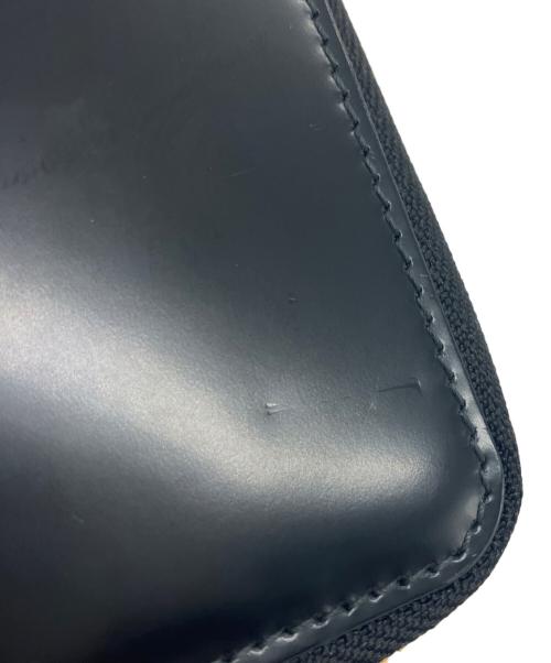 COMME des GARCONS（コムデギャルソン）COMME des GARCONS (コムデギャルソン) ラウンドファスナー財布の古着・服飾アイテム