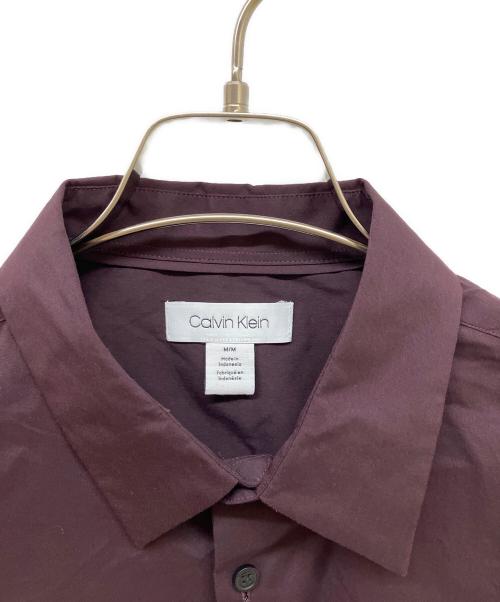 Calvin Klein（カルバンクライン）Calvin Klein (カルバンクライン) シャツ ボルドー サイズ:M 未使用品の古着・服飾アイテム