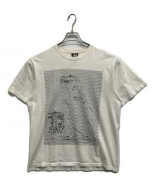 stussy（ステューシー）の古着「恐竜グラフィックTシャツ」｜ホワイト
