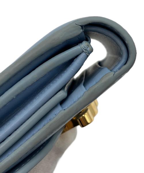 CELINE（セリーヌ）CELINE (セリーヌ) Small Flap Wallet/スモール フラップウォレット トリオンフ パステルブルーの古着・服飾アイテム