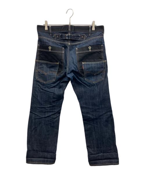 eYe COMME des GARCONS JUNYAWATANABE MAN（アイ コム デ ギャルソン ジュンヤ ワタナベ マン）eYe COMME des GARCONS JUNYAWATANABE MAN (アイ コム デ ギャルソン ジュンヤ ワタナベ マン) LEVI'S (リーバイス) Wネーム再構築デニムパンツ インディゴ サイズ:Mの古着・服飾アイテム