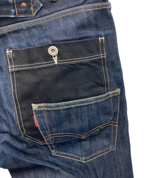 eYe COMME des GARCONS JUNYAWATANABE MAN（アイ コム デ ギャルソン ジュンヤ ワタナベ マン）eYe COMME des GARCONS JUNYAWATANABE MAN (アイ コム デ ギャルソン ジュンヤ ワタナベ マン) LEVI'S (リーバイス) Wネーム再構築デニムパンツ インディゴ サイズ:Mの古着・服飾アイテム