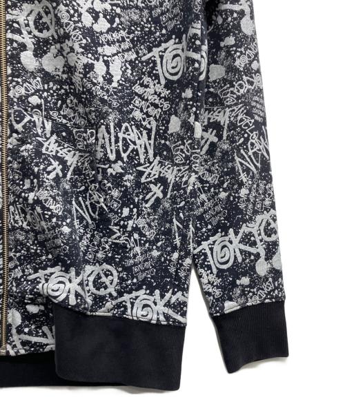 stussy（ステューシー）stussy (ステューシー) 総柄ジップパーカー ブラック サイズ:Mの古着・服飾アイテム
